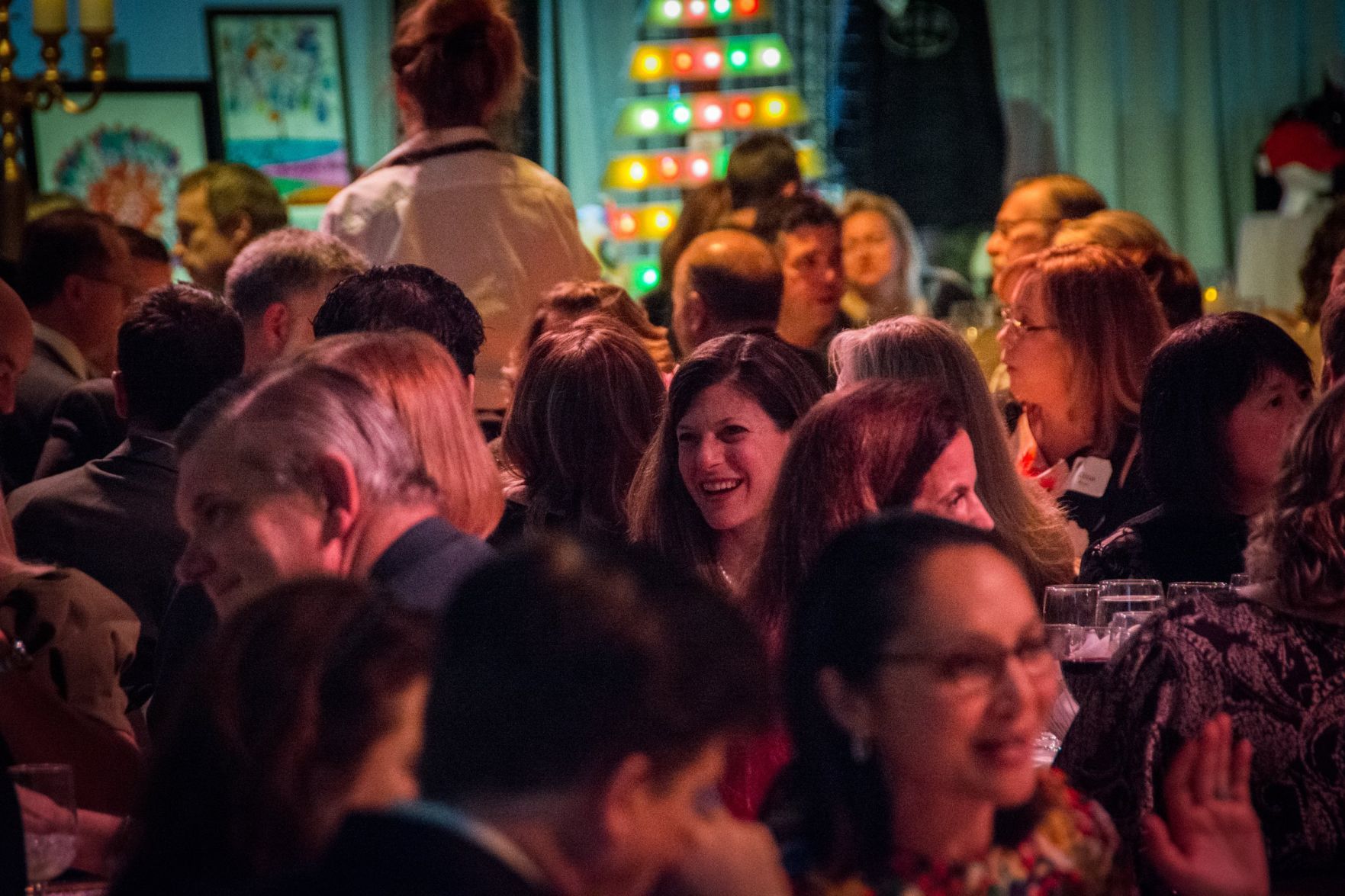 Guests chat over dinner